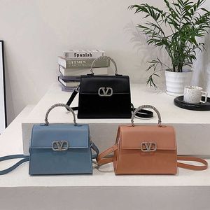 Genuine Leather Valentins Handbag 2023 Spring New Fashion Womens Solid Color Diamond Embedding Fresh and Sweet Leisure Texture Crossbody Western Style Womens XJRR