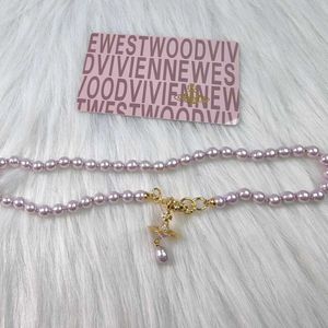 Designer Viviene Westwood Ny Viviennewestwood New Empress Dowager Vivian's Baroque UFO Water Drop Pearl Necklace Light Luxury Uniquy Purple Gold Pearl Saturnurn