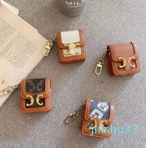 Classic Creative Leather Keychain Car Women's Wallet Bag Pendant Wallet Bag Car Cute Handmade Leather Lipstick Mini Headset Bag Keychain