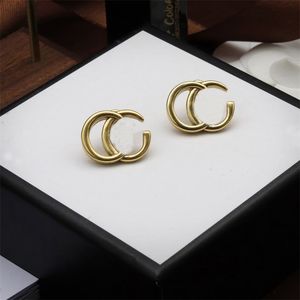 Famosi orecchini di design da donna orecchini di lusso placcati in oro argento piccolo ciondolo a cerchio lettera cuore piccolo vintage semplicità orecchini di design vuoti casual zb109