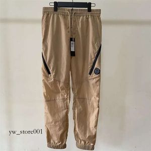 Calças cp cp calças masculinas jogger estiramento bolso moletom estilo britânico zíper esportes ao ar livre calçaschina 251