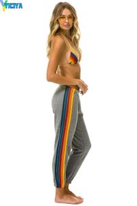 Pantaloni per pantaloni sportivi a strisce a strisce arcobaleno Yiciya pantaloni sportivi in ​​stile Europa-USA Donne/ragazza Mid Waist Bande elastici pantaloni