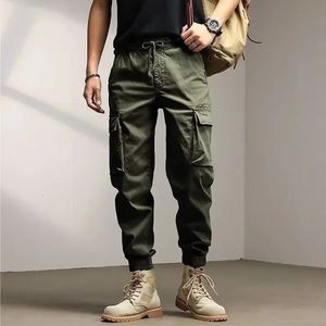 Calças masculinas soltas calças de carga sólida com vários bolsos casual tático trabalho calça reta calças ao ar livre caminhadas macacão masculino 231129