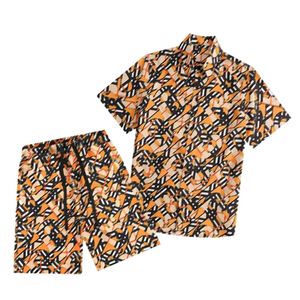 Camisa masculina de designer famosa Camisa de flor havaiana Moda casual Camisa masculina Primavera e verão Letras de flores casuais soltas Praia de praia SS0