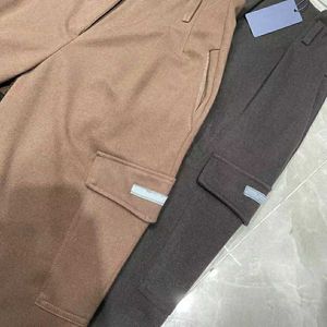 Calças masculinas femininas camiseta de grife agasalho camisa outono inverno família bolso cintura alta fino fundo zíper mistura térmica Harlan Casual Z230731