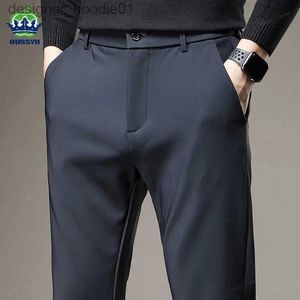 Pantaloni da uomo Autunno Inverno Buono elasticizzato Pantaloni lisci da uomo Spessore Business Elastico in vita Coreano Classico Nero Blu Pantaloni da tuta casual di marca 38 L231129