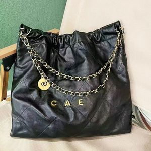 10a mulher designer saco de couro brilhante balde saco de luxo sacos de mulheres bolsas bolsa de bezerro acolchoado bolsa preta bolsa de ombro cc bolsa de corrente