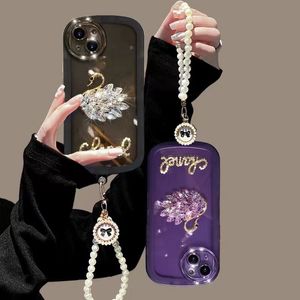 Per la custodia del telefono cellulare 14pro iphone13promax guscio trasparente con braccialetto di perle di cigno con strass di lusso