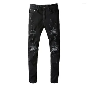 Jeans da uomo stile streetwear nero effetto vissuto alta elasticità slim fit fori danneggiati bandana patchwork qualità skinny strappato