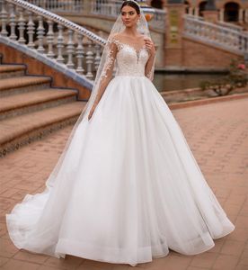 Eleganckie długie koronkowe sukienki ślubne Bateau szyi z rękawami A-line z koralikami Tiul Tiul Train Bridal Suknia Buttons