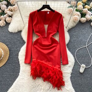 European and American Instagram style fashion high-end celebrity sexy hollow waistband Wrap buttocks feather patchwork irregular dress