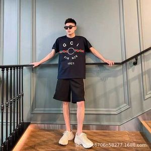 Tシャツの男性SホームGチェストフライド生地のねじれて印刷されたカジュアルな多才な丸い首のゆるいと女性