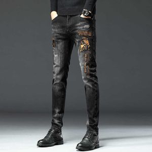 Black jeans men autumn and winter thick slim-fit small foot embroidery fashion brand high-end stretch small straight pants Q231130
