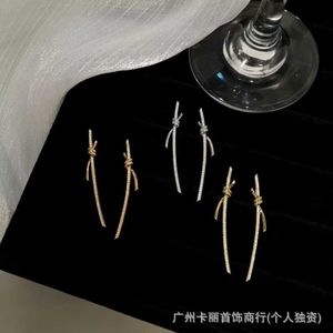 Fashion Brand Rose Gold Rope Knot Long Earrings with White Inlaid Diamond Exquisite Earstuds Design Simple and Light Luxury Instagram for Women