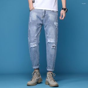 Herr jeans män kläder trevligt hiphop stretchy rippad mager cyklist förstört hål tejpad smal passform denim casual rak byxor