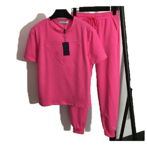 Fashionabla kvinnors t -shirtbyxor Tracksuits Två sport svär nya sportkläder triangel kortärmad vår kortärmad ärm elastisk midja casual sportkläder