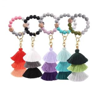 NY! Gynna silikonpärlor Armband Keychain Three Layer Cotton Tassel Wrist Keyring Bead Bangle Key Ring Women Bag Pendant Decoration FY3422 0202