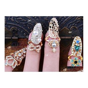 Anelli a fascia Gioielli di moda Anello per unghie in metallo Scavato Bowknot Corona Fiore Strass Unghie Bellezza Consegna in goccia Dh7Mo