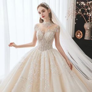 Dubai Arabic Ball Gown Wedding Dresses Plus Size Sweetheart Backless Sweep Train Bridal Gowns Bling Luxury Beading Sequins crysatl Wed Dresses 2023