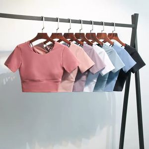 Top de ioga Luluwomen com almofada no peito roupas de pilates esportivas de verão de manga curta para mulheres com umbigo e lindas roupas de ginástica nas costas