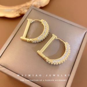 Charm designer earrings Real Gold plating Zircon letter D Earrings Fashion atmospheric Metal studs Gold buckle simple earrings female
