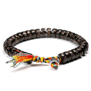 Strand pärlstav strängar tibetanska buddhistiska hand flätade bomullstråd armband kvinnor män naturliga kokosnötskal pärlor snidade om mani padme brum