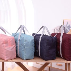 Bolsas de armazenamento Nylon Travel dobrável UNISSISEX Beda de bolsa de grande capacidade Mulheres bolsas à prova d'água Men Saver Space for TravelStorage