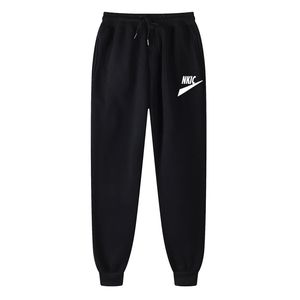 Pantaloni da uomo palestra fitness che gestisce pantaloni della tuta allenamento atletico pantaloni lunghi pantaloni da allenamento all'aperto pantaloni sport elastici tasche a vita elastico stampa logo marchio