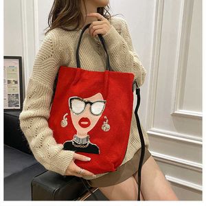 Kadın çantası yeni yüksek kapasiteli gözlükler güzellik çantası moda pullu kişilik portatif haberci çanta