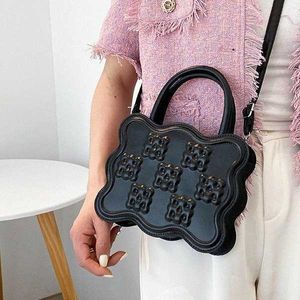 Embossed bag Women's bag Autumn and winter new fashion portable small square bag Simple women's one-shoulder messenger bag