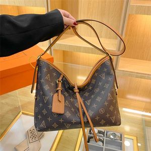 2023 Purses Clearance Outlet Online Sale Ny Vintage Printed Hand Single Shoulder Messenger Tote Fashion Stora kapacitet Enkel utländsk stil Kvinnospåse