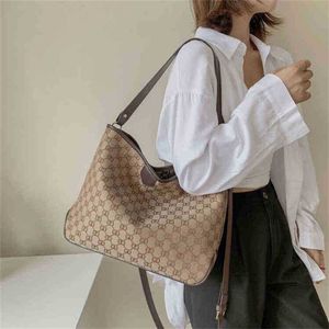 Borsa di design Negozio con sconto del 60% sulle borse Borsa da donna con sensazione avanzata, nuova e versatile borsa in tela ad aria, semplice, con una spalla, di grande capacità