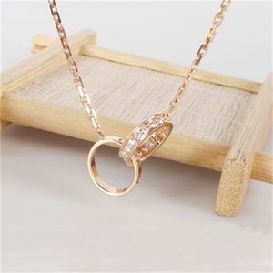 Collana con pendente di gioielli di lusso da donna, collane di design in oro placcato, mini cerchio placcato in oro rosa, accessori per collana di design con pendenti in cristallo a catena da donna