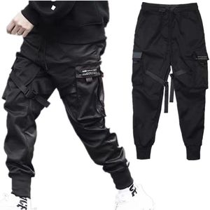 Pantaloni da uomo Hip Hop Boy Track Elastico in vita Harem Uomo Streetwear Punk Nastri Design Pantaloni Uomo Nero Tasche Jogging 230207