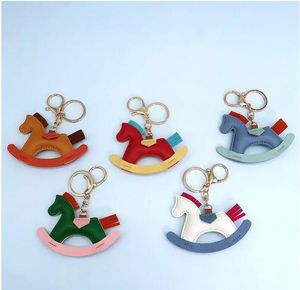 Rocking Horse Keychains Rings PU Leather Animal Pendant Key Chains Jewelry Car Keys Holder Cute Cartoon Fashion Design Women Bag Hanging Charm Keyrings Gift