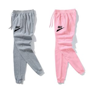 Spodnie damskie jesienne męskie sporty spodni Kieszenie Szkolenie elastyczne pasa jogging swobodne marka litera druk spodni dresowe