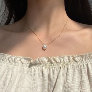 Naszyjniki wiszące moda Naszyjka serca Dziewczyna Łańcuch Clavicle Sain Zakruci Pearl Choker Temperament Estetyka Biżuteria Urok Prezent dla kobiet