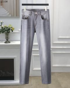 2023 Hurtowe męskie dżinsy Nowe dżinsy młodych mężczyzn wiosna i jesień Nowe proste luźne dżinsy koreańskie mody mody Casual Pants Men Button Fly 29-42