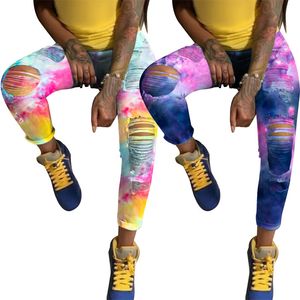 ヨーロッパ系アメリカ人のジーンズ洗浄された明るい色の染色と印刷された2色のタイ染色デニム女性のズボン9075y