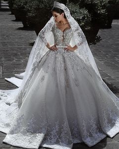 Luxury Duabi Wedding Dress Long Sleeves Lace Applique V-neck Crystals Beaded Long Bridal Ball Gown Vestido De Novia Gorgeous Chapel Bride Dresses