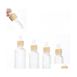 Förpackningsflaskor 30 ml droppflaska tom påfyllningsbar injektionsflaska kosmetisk behållare frostad glasburk med imiterad bambu cap leverera dhm3m