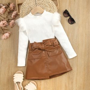 Clothing Sets 16Y Kids Girls Autumn Clothes Set Baby Solid Color Feather Trim Long Sleeve Knit Tops PU Leather Belted Skirt Children Outfit 230208