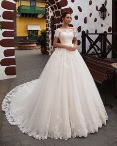 Afrikanisches Dubai, elegantes, langes A-Linien-Hochzeitskleid, durchsichtiges Rundhalsausschnitt, Spitzenapplikationen, Perlen, Vestios De Novia Brautkleider mit Knöpfen, Übergröße, Strand-Hochzeitskleid