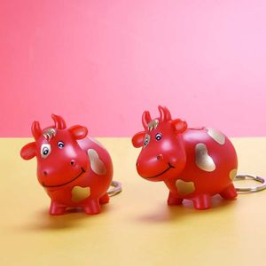 Keychains 2023 Arrival Year Of The OX Chinese Culture Mascot Bag Pendant Red Cow Sound Luminous LED Key Chain Keyring Childrens Toys