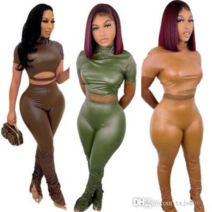 2023 Hög Elastic Leather Women Tracksuits 2 Piece Pants Set Designer Short Sleeve Crop Tops Outfits Bodysuit S-XXL