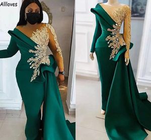 Arabic Aso Ebi Dark Green Mermaid Prom Dresses Gold Appliqued Lace Beaded Sheer Neck Long Sleeves Evening Gowns Peplum Side Train Satin Women Formal Wear CL1816