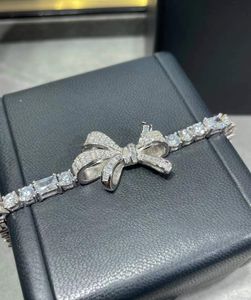 Elegante braccialetto con fiocco Tilda con diamanti di ghiaccio Bracciale femminile con catena in zirconi in argento sterling 925 con gioielli da sposa con fiocco in cristallo