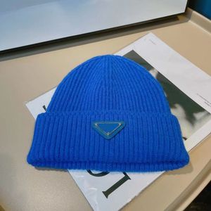 Designer triangle knitted wool hat Men's and women's autumn and winter fried street short hat