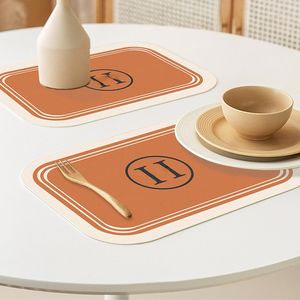 Placemat vattentät oljebeständig termisk skärmad dyna hushåll anti-scald te bordtyg skrivbord skyddande dyna matbord kudde 30 * 40 cm