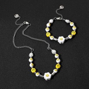 New stainless steel smiley face bracelet for men and women's small fresh sunflower pearl necklace